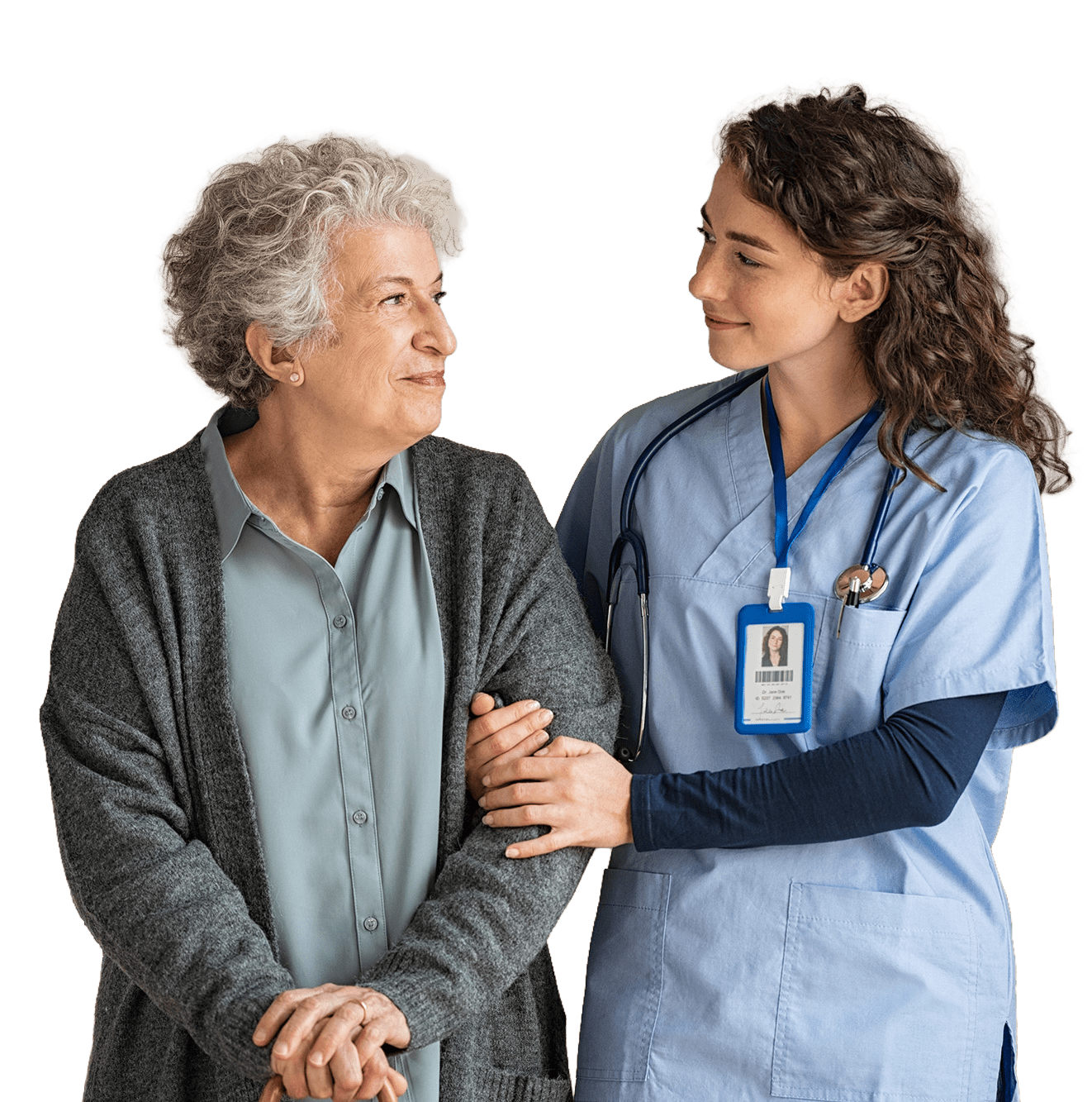 A healthcare worker smiles at an elderly woman, offering support as they engage in a caring conversation, highlighting patient-provider connection.